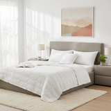 This down blanket is covered in pristine hues of white. Enjoy the coolest sleep every night with these white down blankets.