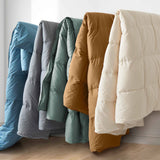 The down feather comforter is covered in solid colors of soft beige or hues of off-white that give it a crisp appearance. Bring natural light to your bedding space and turn it into a cozy spot, while you enjoy the natural feeling of cottony softness with this off white feather comforter.