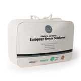 Crafted in Germany, this luxury down comforter features 90% white duck down in the medium weight and 90% white goose down in the extra warm version. With a soft, down-proof cotton shell and baffle box construction, it offers breathable warmth, even fill, and premium comfort—perfect for year-round or cold weather use.