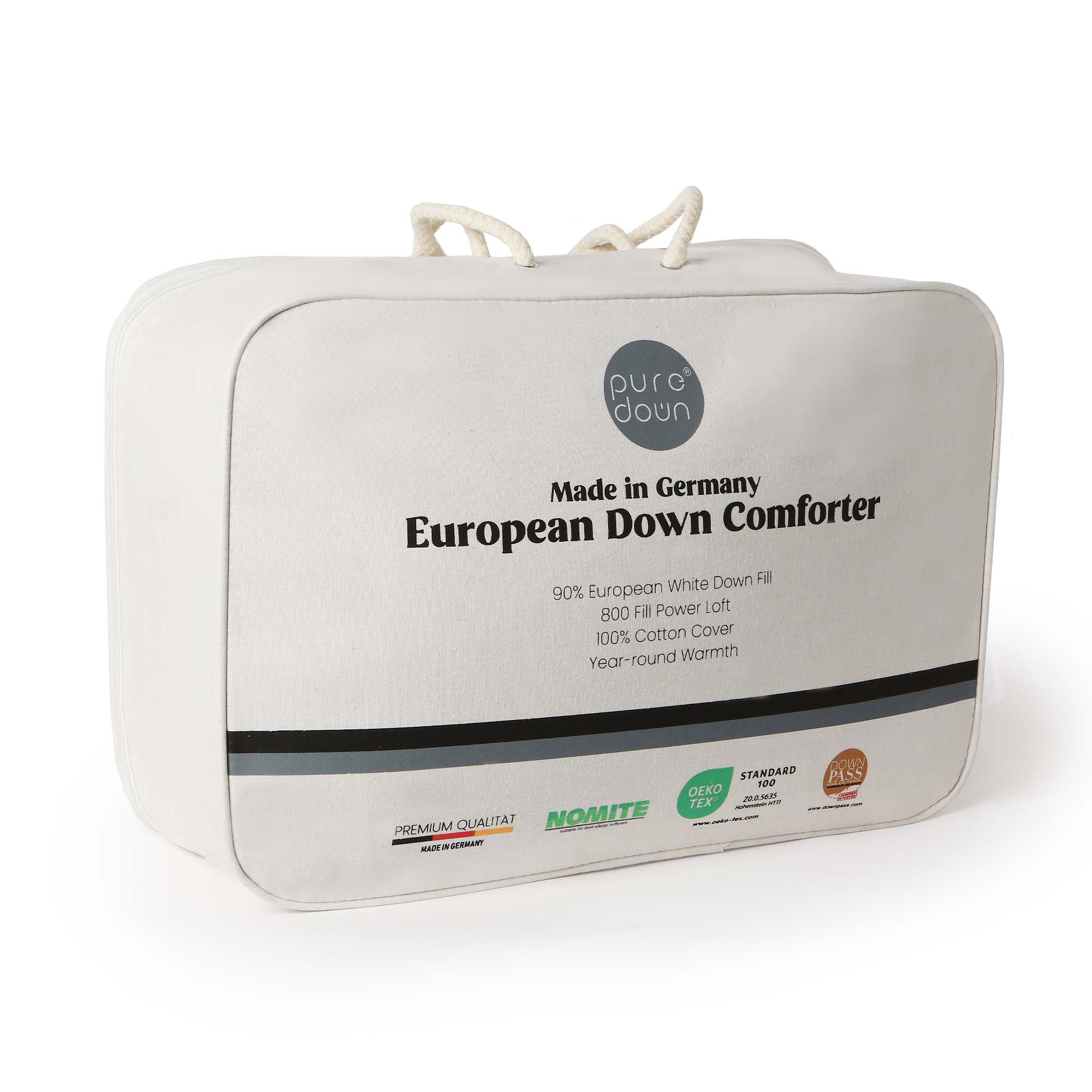 Crafted in Germany, this luxury down comforter features 90% white duck down in the medium weight and 90% white goose down in the extra warm version. With a soft, down-proof cotton shell and baffle box construction, it offers breathable warmth, even fill, and premium comfort—perfect for year-round or cold weather use.