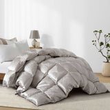 The comforter is covered in a brilliant silvery-gray shade and features soft damask patterns throughout that add a touch of texture to the fabric. Bring home the beauty of sophistication with this silk comforter.