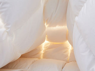 a white blanket with light coming out of it
