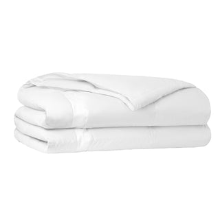 The lightweight summer comforters are brushed in the solid colors of white. Revel in a cloud of comfort in your modern bedroom design with this down blanket.