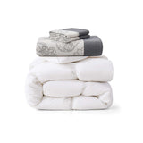 Transform your sleep space into a cozy yet elegant retreat with our European Down Bedding Bundle, including a luxurious comforter, a soft duvet cover, and matching pillowcases. Filled with responsibly sourced European down for creamy loft and gentle warmth, this bundle is encased in down-proof, breathable fabric for durability and sleep comfort. Certified with RDS, OEKO‑TEX®, and luxury standards, it delivers premium softness and sustainable quality, making it perfect for year-round rest in style.