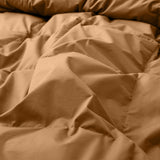 Wrap yourself in the earthy warmth of our Fawn Organic Cotton Down Comforter. This neutral beige comforter is designed with a natural GOTS-certified organic cotton shell and filled with plush, responsibly sourced down and feather fiber for breathable comfort year-round. The fawn tone adds a cozy, grounding presence to any bedroom, making it an ideal choice for those who love warm neutrals and organic, sustainable bedding that soothes both body and mind.