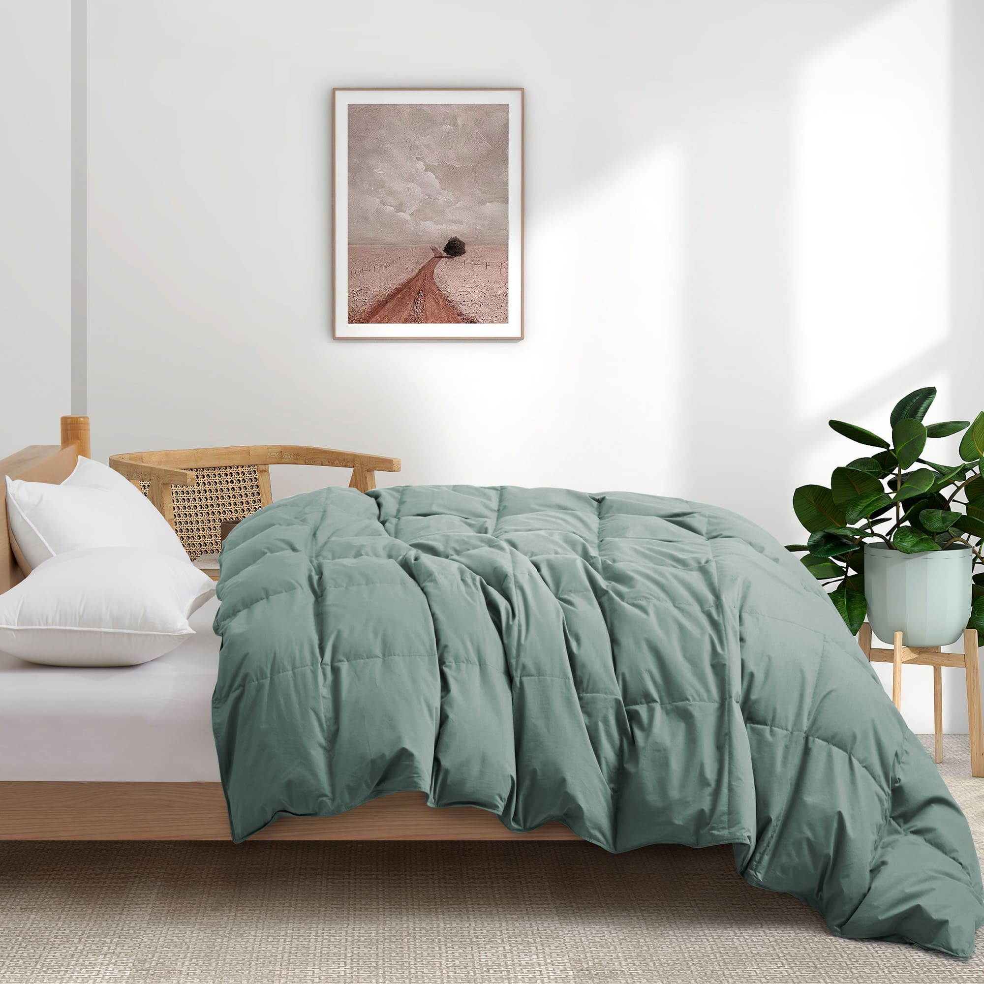 Embrace a luxurious, comfortable sleep every night with the Puredown All Season Organic Cotton Down Feather Fiber Comforter. The duvet insert can be attached to your duvet cover with ease, thanks to the four corner loops. Double-needle stitching coupled with elegant piping that lines the feather and down comforter ensures a sturdy seam, reducing duvet filling loss and lending the all-season feather comforter a tailored appearance.