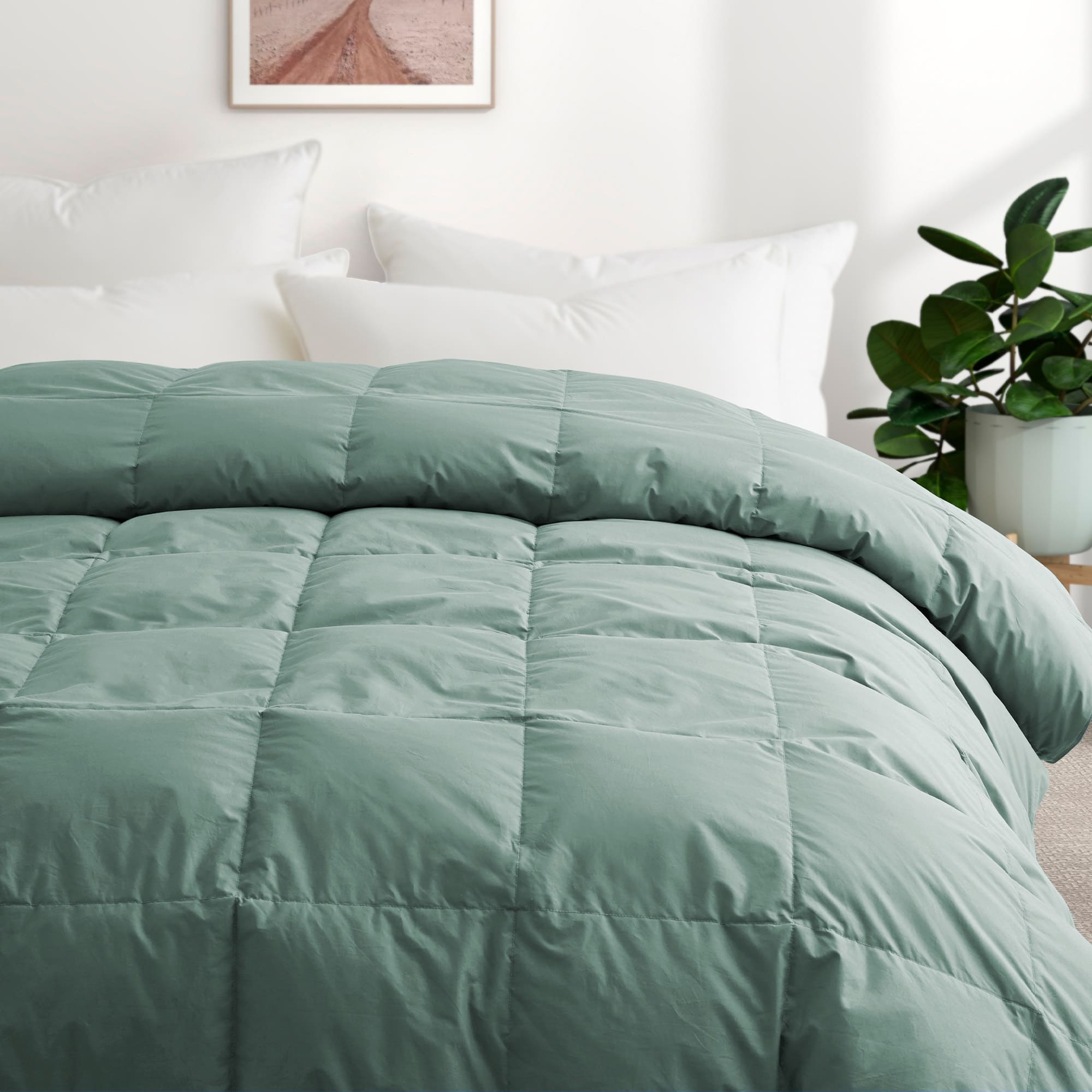Embrace a luxurious, comfortable sleep every night with the Puredown All Season Organic Cotton Down Feather Fiber Comforter. The duvet insert can be attached to your duvet cover with ease, thanks to the four corner loops. Double-needle stitching coupled with elegant piping that lines the feather and down comforter ensures a sturdy seam, reducing duvet filling loss and lending the all-season feather comforter a tailored appearance.