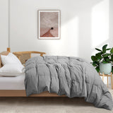 Indulge in the luxurious softness and durability of our organic comforter option in a versatile and chic gray shade, offering a cozy and sustainable way to enrich your sleep experience and enhance your bed in luxury style.