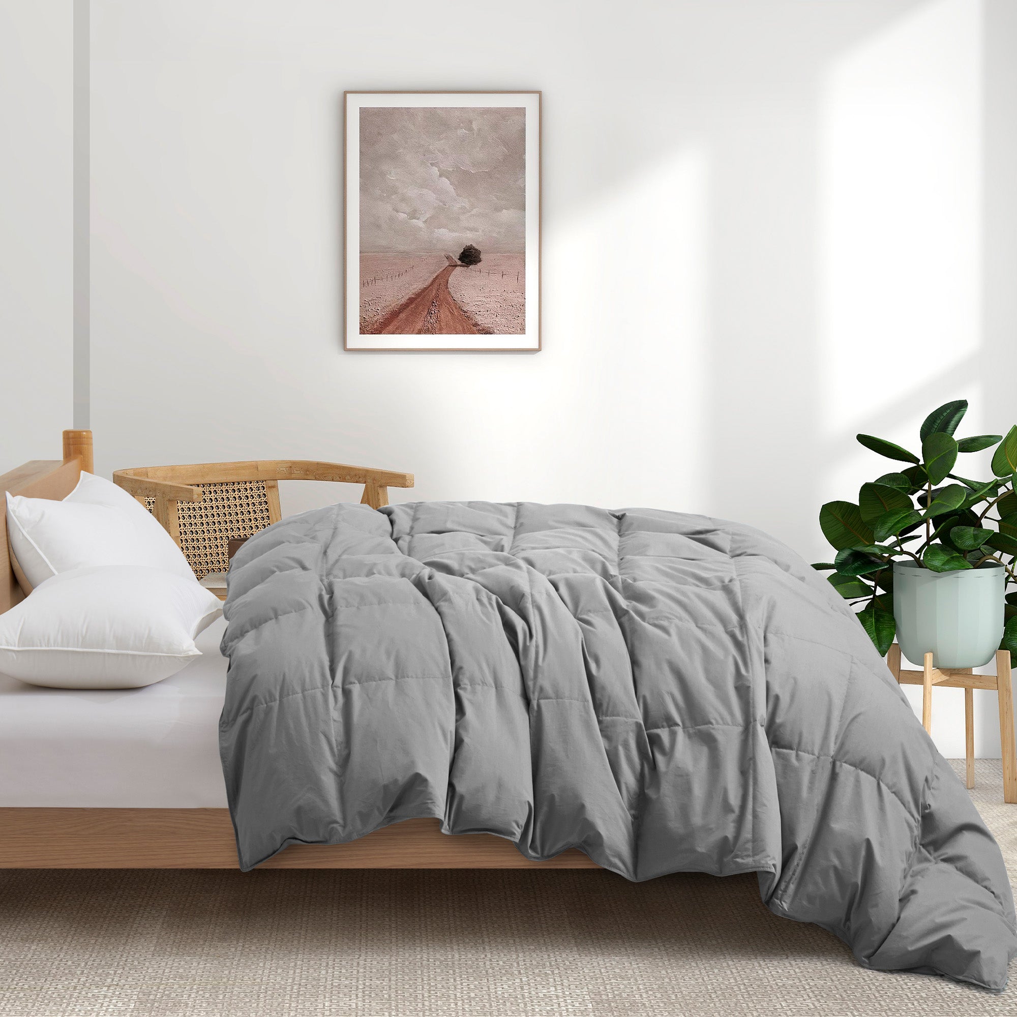 Indulge in the luxurious softness and durability of our organic comforter option in a versatile and chic gray shade, offering a cozy and sustainable way to enrich your sleep experience and enhance your bed in luxury style.