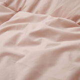 Soft, romantic, and endlessly cozy, our Smoke Rose Organic Cotton Down Comforter is a dream come true for anyone who loves gentle hues and feminine touches. The dusty pink shade adds subtle charm to your space, while the lightweight organic cotton shell and natural down and feather fiber fill offer breathable, all-season warmth. Perfect for layering or using on its own, this pink organic comforter is as stylish as it is sustainable.