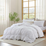 Experience timeless comfort with our White Organic Cotton Down Comforter — a must-have for those who value clean, classic bedding. Crafted from GOTS-certified organic cotton and filled with 100% down and feather fiber, this breathable and lightweight comforter is perfect for all-season use. The crisp white color creates a fresh, hotel-quality look while offering unmatched softness and natural temperature regulation. Whether styled alone or layered with other bedding, this white comforter elevates any bedroo