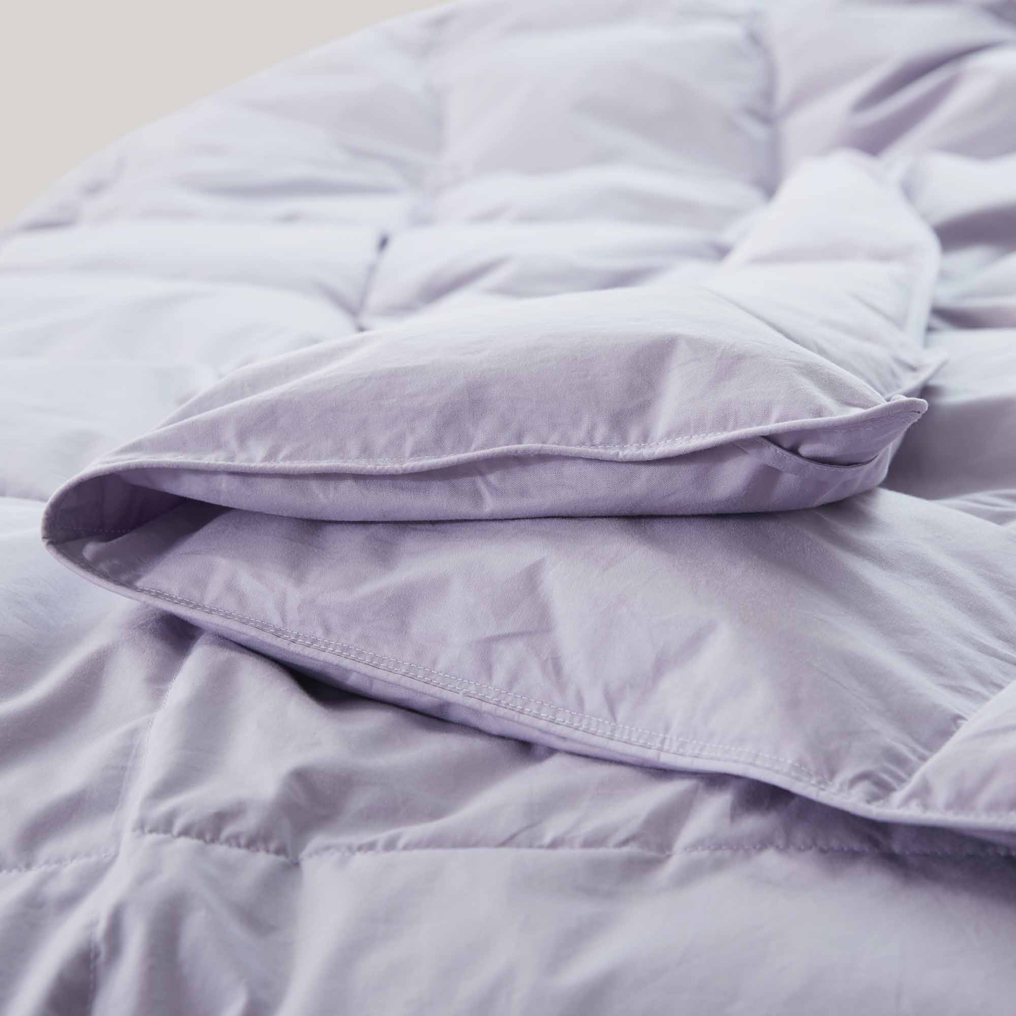 The Lavender organic cotton comforter brings a soft, calming touch to your bedding. Its breathable and lightweight design makes it perfect for warm climates or layering, while the soothing hue adds a subtle pop of color to any room.