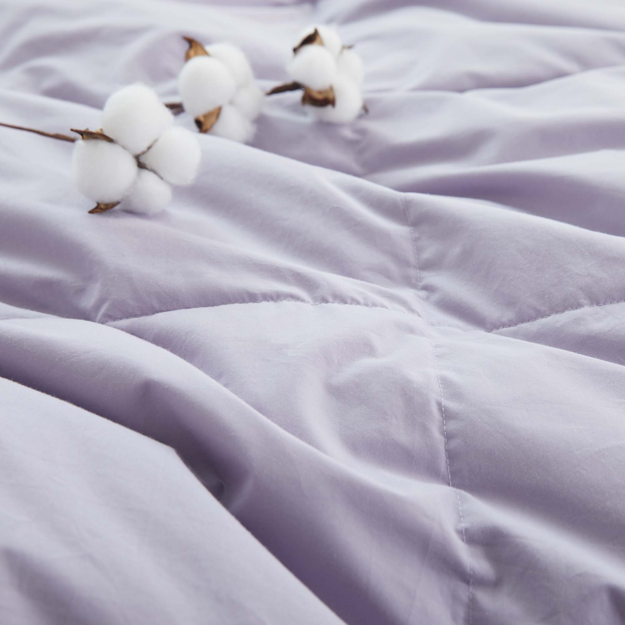 The Lavender organic cotton comforter brings a soft, calming touch to your bedding. Its breathable and lightweight design makes it perfect for warm climates or layering, while the soothing hue adds a subtle pop of color to any room.