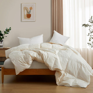 The lightest weight down comforter with feathers is covered in crisp tones of off white. Add a touch of contemporary finesse to your bedroom or bedding option with this off-white cover feather down comforter.