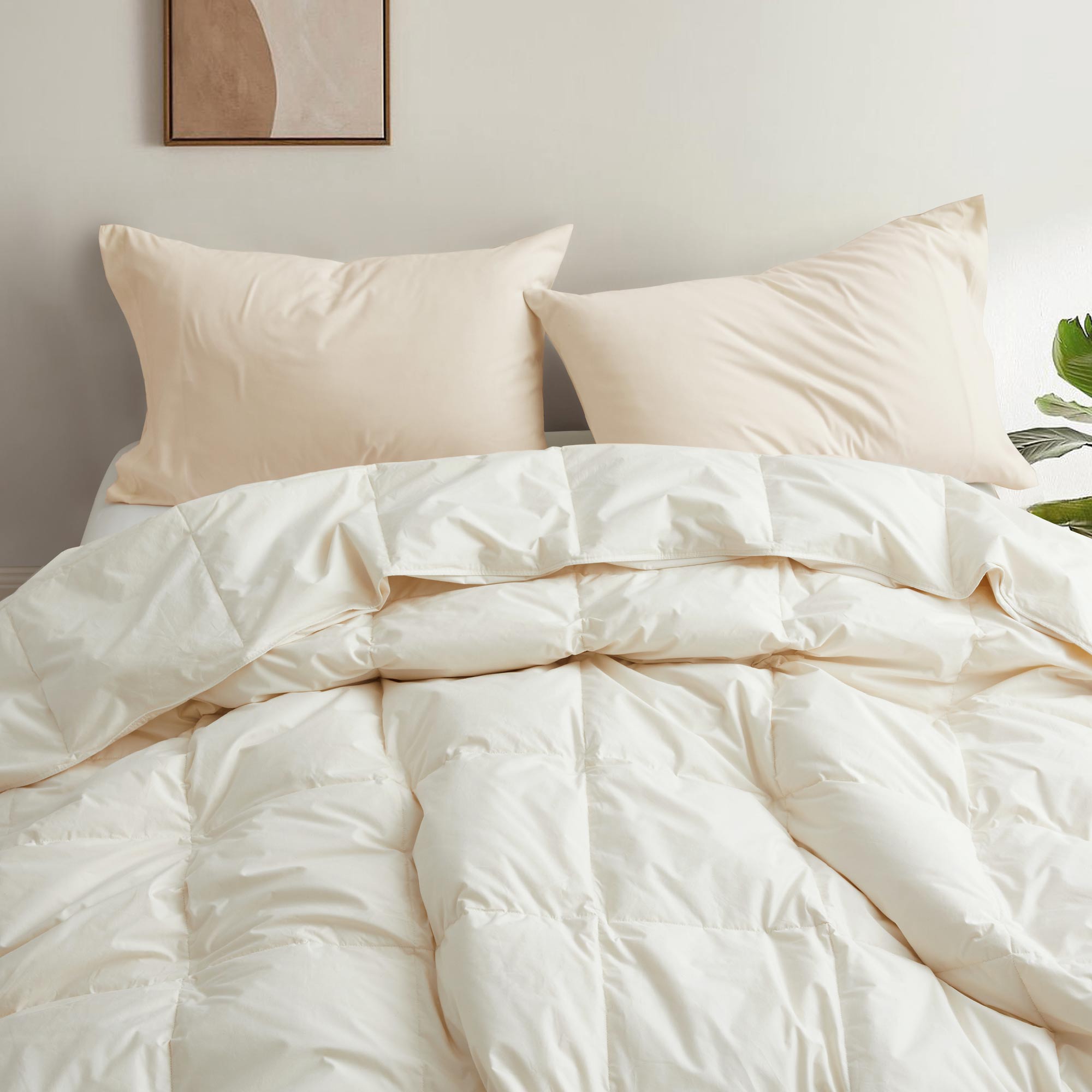 The lightest weight down comforter with feathers is covered in crisp tones of off white. Add a touch of contemporary finesse to your bedroom or bedding option with this off-white cover feather down comforter.