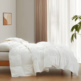 The lightest organic cotton comforter with feathers is covered in crisp tones of white. Add a touch of contemporary finesse to your bedroom or bedding option with this white cover feather down comforter.