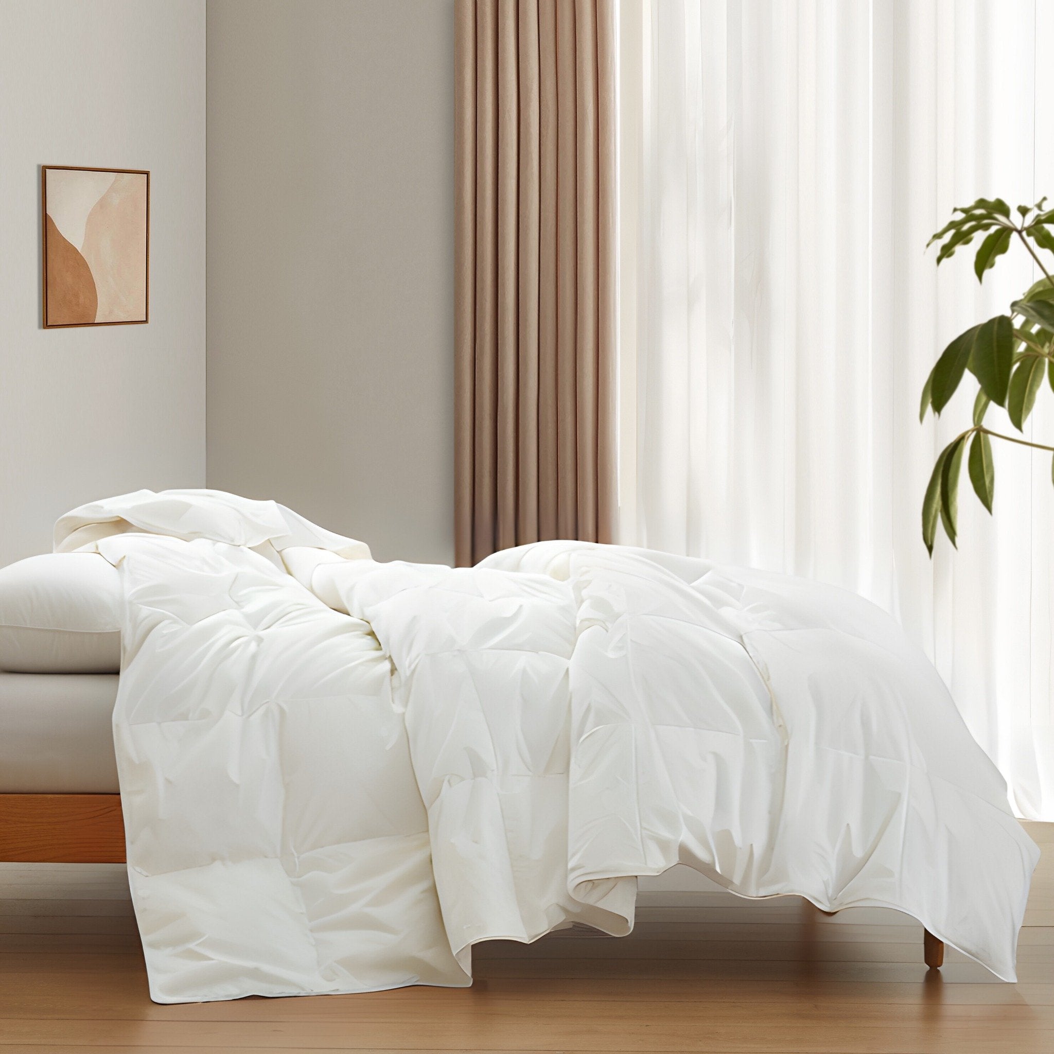 The lightest organic cotton comforter with feathers is covered in crisp tones of white. Add a touch of contemporary finesse to your bedroom or bedding option with this white cover feather down comforter.