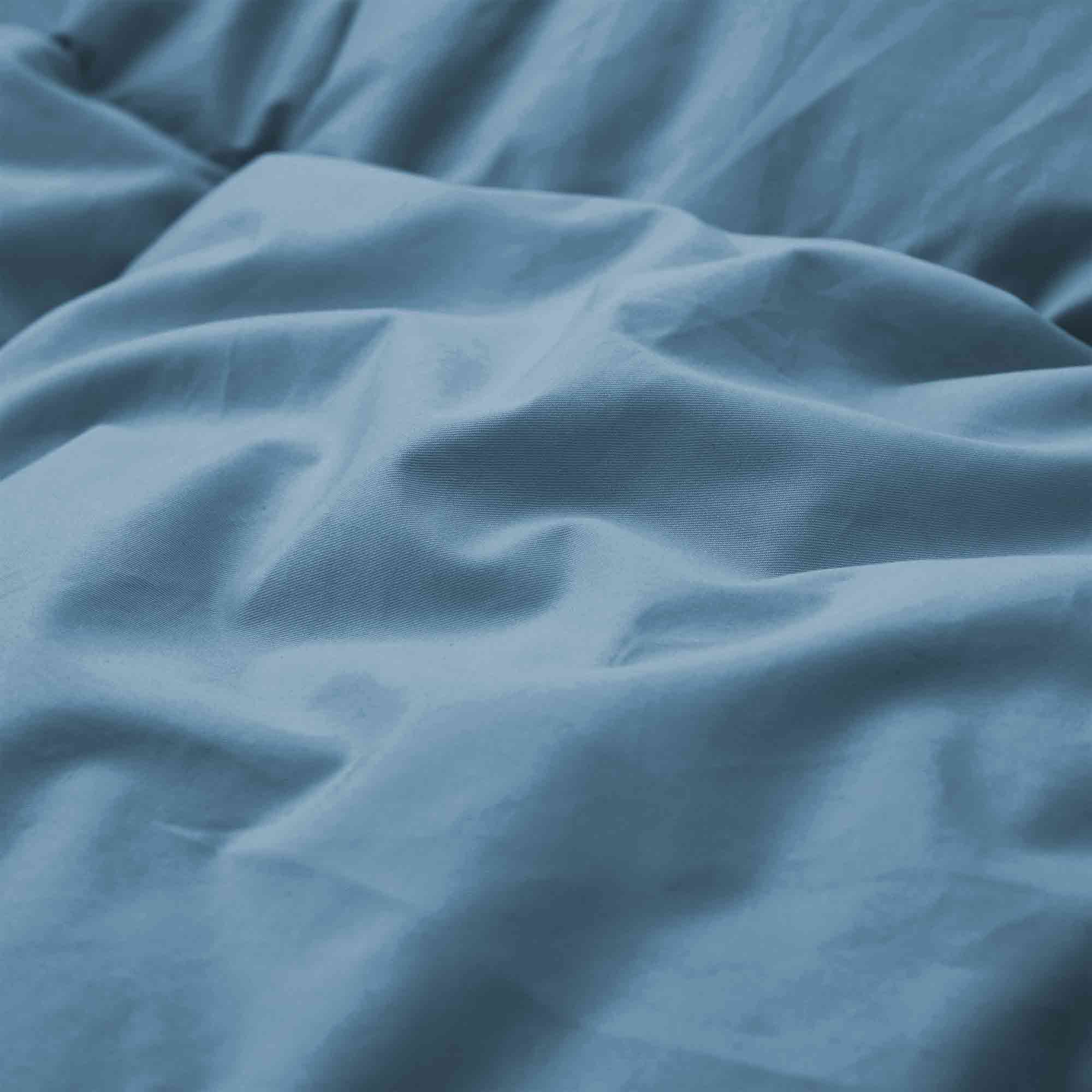 Elevate your sleep setup with our Castle Blue Organic Cotton Comforter, featuring a deep, rich blue hue that brings bold elegance to any bedroom. Made with GOTS-certified organic cotton and filled with down and feather fiber, this luxurious comforter offers breathable warmth and long-lasting comfort. Ideal for modern or dramatic interiors, the Castle Blue version is a statement piece that combines sustainable materials with sophisticated design