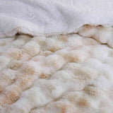 Brown faux rabbit fur comforter set styled with sherpa reverse and coordinating zip-closure pillow shams, offering a warm and elegant bedroom look.