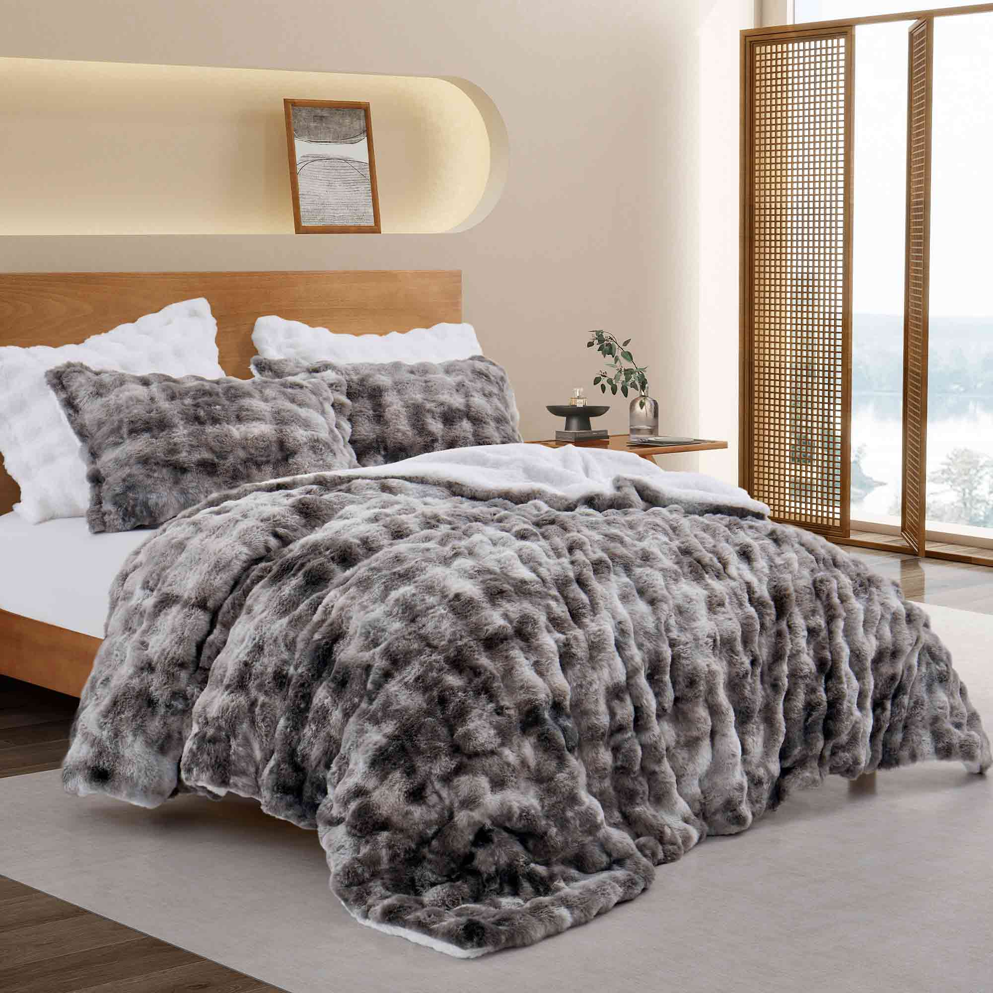 Dark Grey faux rabbit fur comforter set with sherpa backing and matching pillow shams, combining modern style with cozy comfort.