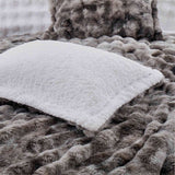 Dark Grey faux rabbit fur comforter set with sherpa backing and matching pillow shams, combining modern style with cozy comfort.