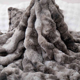 Dark Grey faux rabbit fur comforter set with sherpa backing and matching pillow shams, combining modern style with cozy comfort.