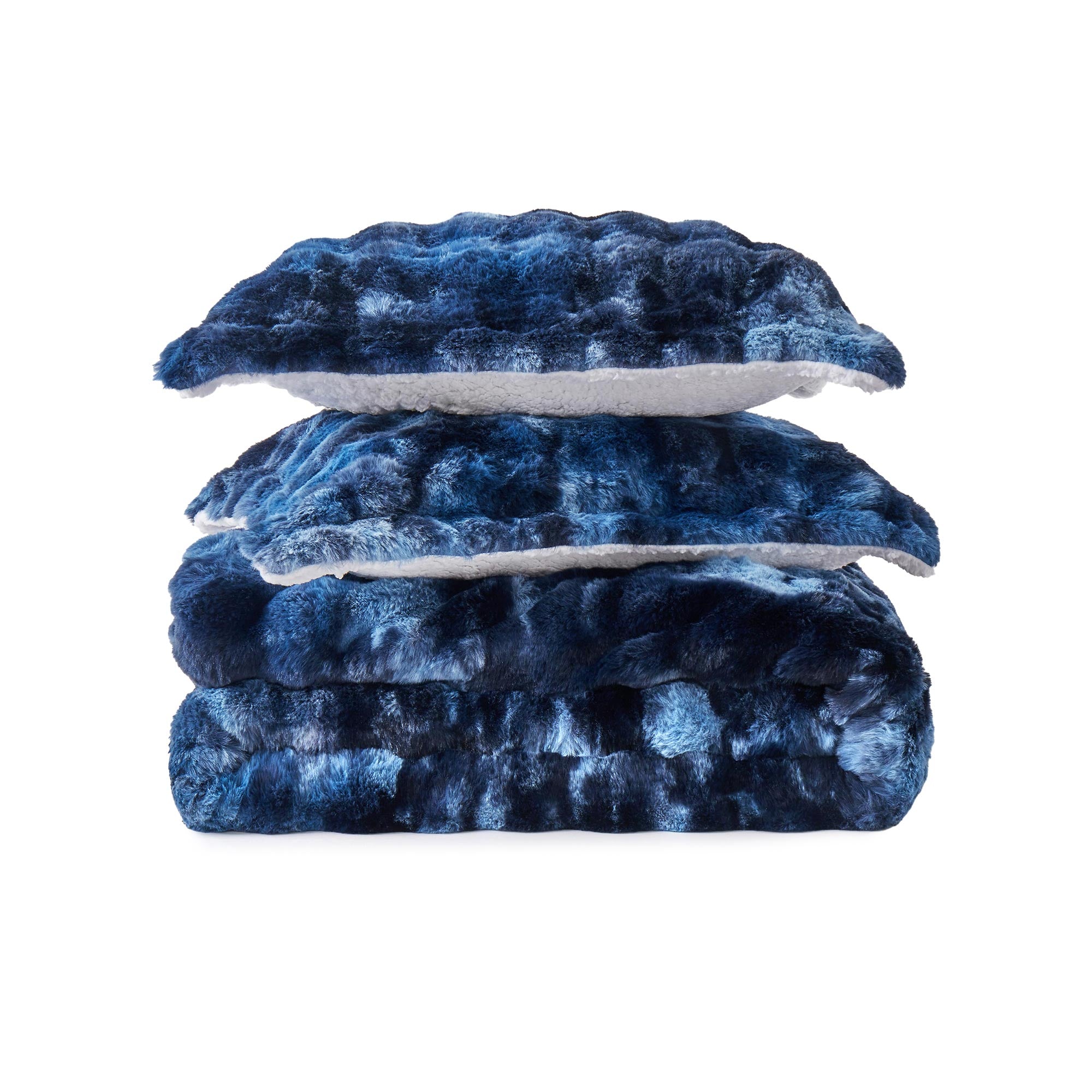 Navy faux rabbit fur comforter set featuring a reversible sherpa lining and pillow shams, adding a bold yet inviting touch to the bedroom.