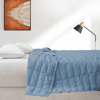The down blankets are brushed in the mineral blue hues of rock. Provoke feelings of stability and calmness in your space with this down blanket in Rock Blue.