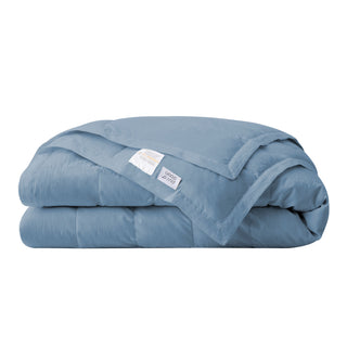 The down blankets are brushed in the mineral blue hues of rock. Provoke feelings of stability and calmness in your space with this down blanket in Rock Blue.