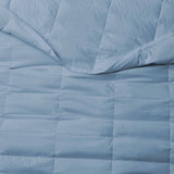 The down blankets are brushed in the mineral blue hues of rock. Provoke feelings of stability and calmness in your space with this down blanket in Rock Blue.