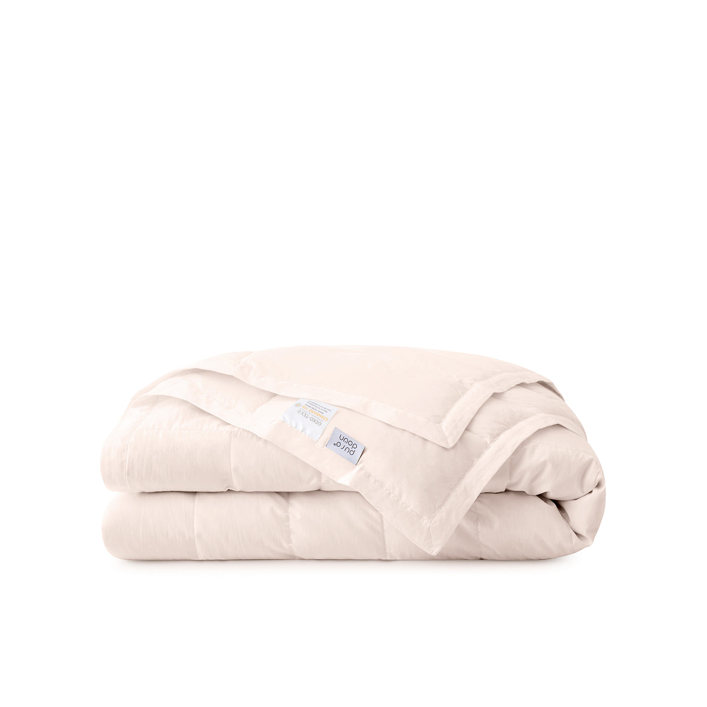 The down blanket is brushed in soft tones of pink. Add a touch of subtle beauty to your room with this cooling tencel lyocell blanket.