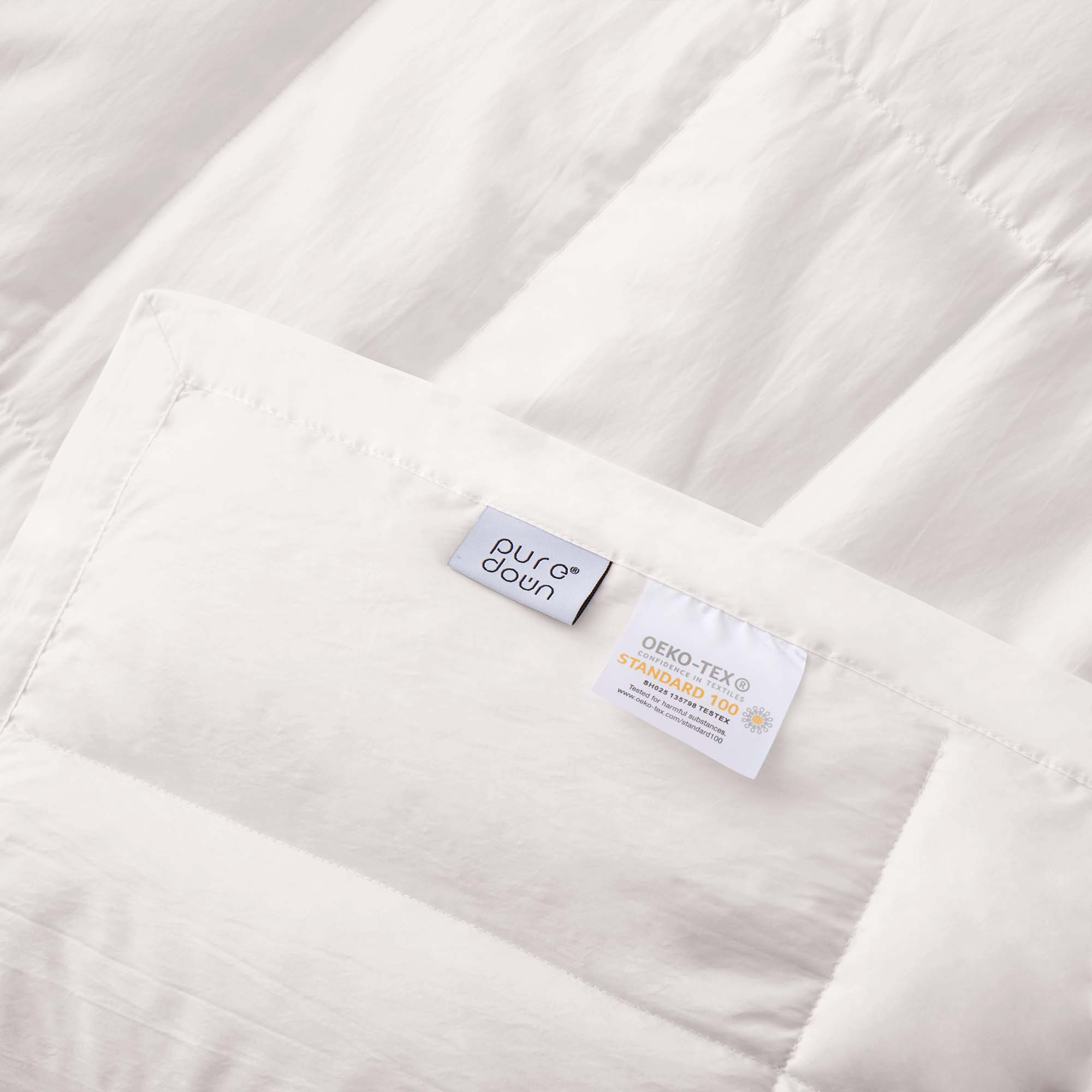 This down blanket is covered in pristine hues of white. Enjoy the coolest sleep every night with these white down blankets.