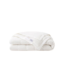 This down blanket is covered in pristine hues of white. Enjoy the coolest sleep every night with these white down blankets.