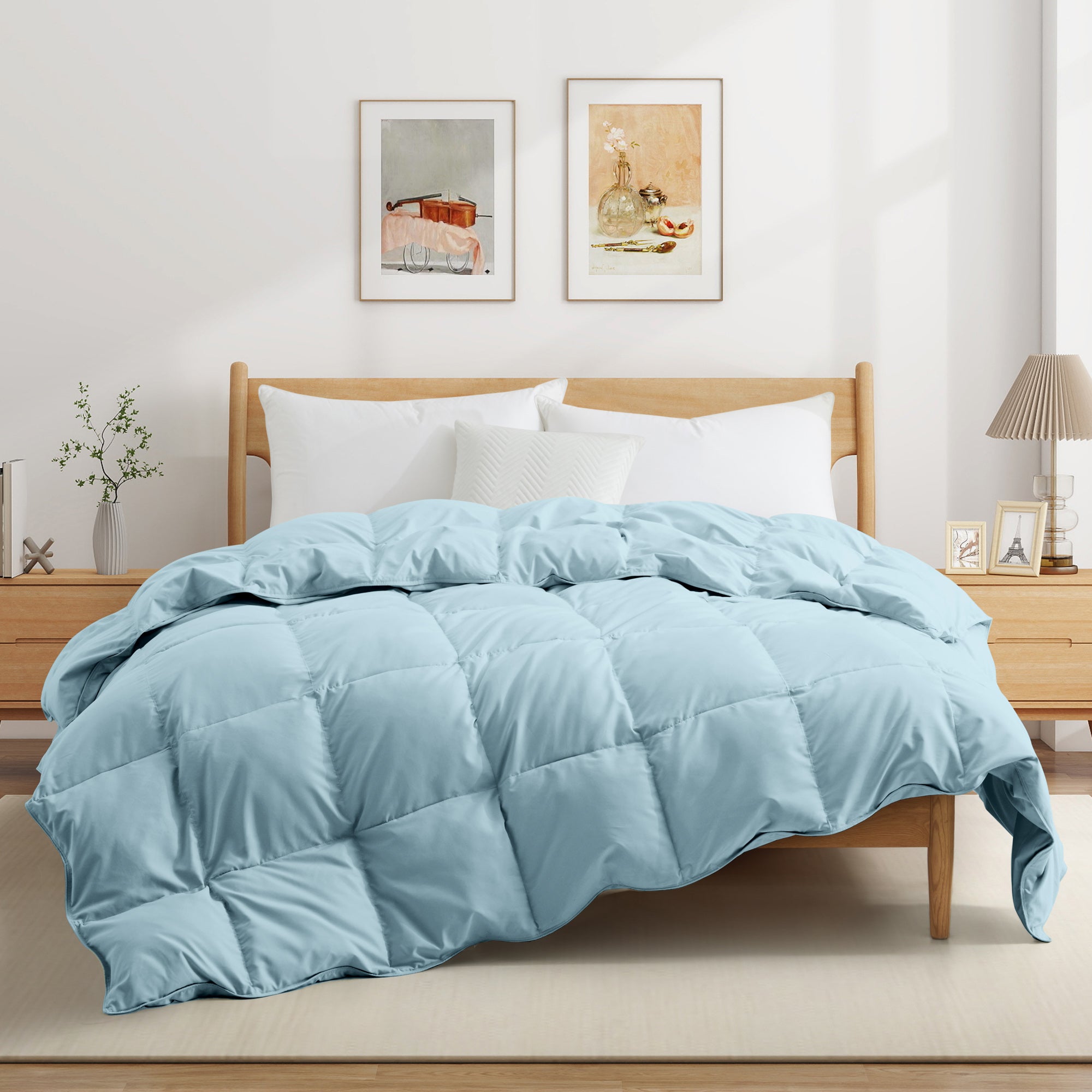 The down comforter with feathers is enveloped in the pristine shades of Sky Blue. Enjoy a cloud-like experience for a cozy sleep with this superior quality down feather comforter with duvet ties.