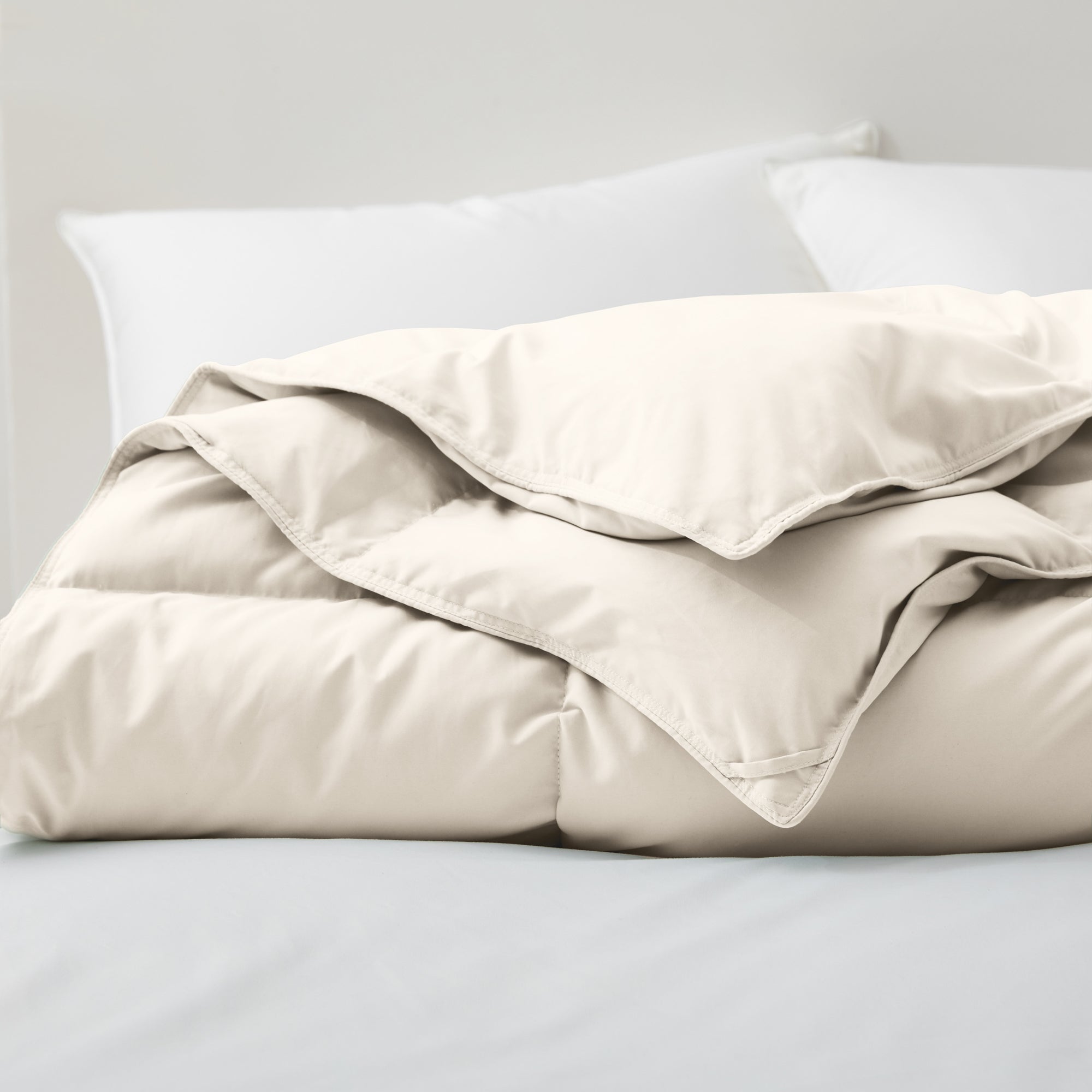 The feather goose down comforters are covered in the subtle touch of cream hues. Bring lavish comfort to your personal space with these feather goose down comforters.