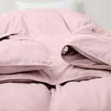 The feather goose down comforter is available in the feminine tones of Pink. Enjoy balanced year-round warmth with this feather goose down comforter.
