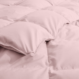 The feather goose down comforter is available in the feminine tones of Pink. Enjoy balanced year-round warmth with this feather goose down comforter.