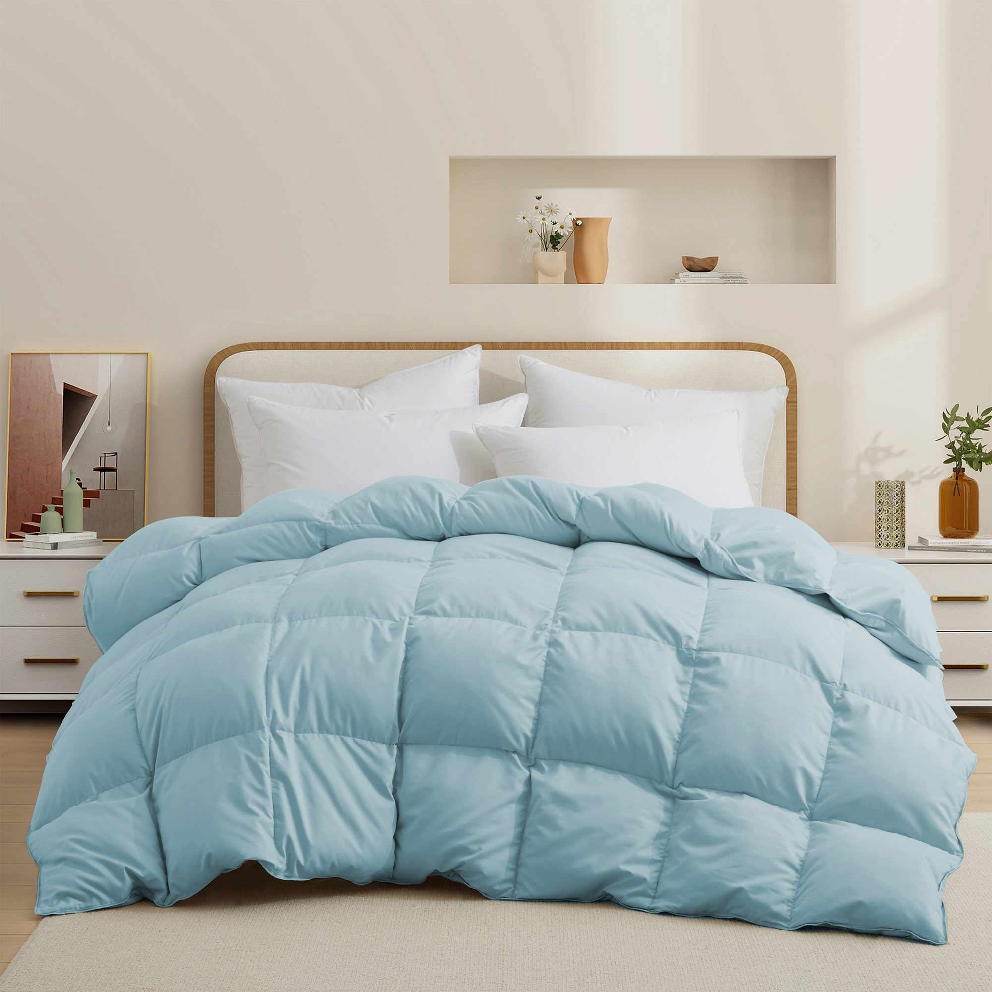 The down comforter with feathers is enveloped in the pristine shades of Sky Blue. Enjoy a cloud-like experience for a cozy sleep with this superior quality down feather comforter with duvet ties.