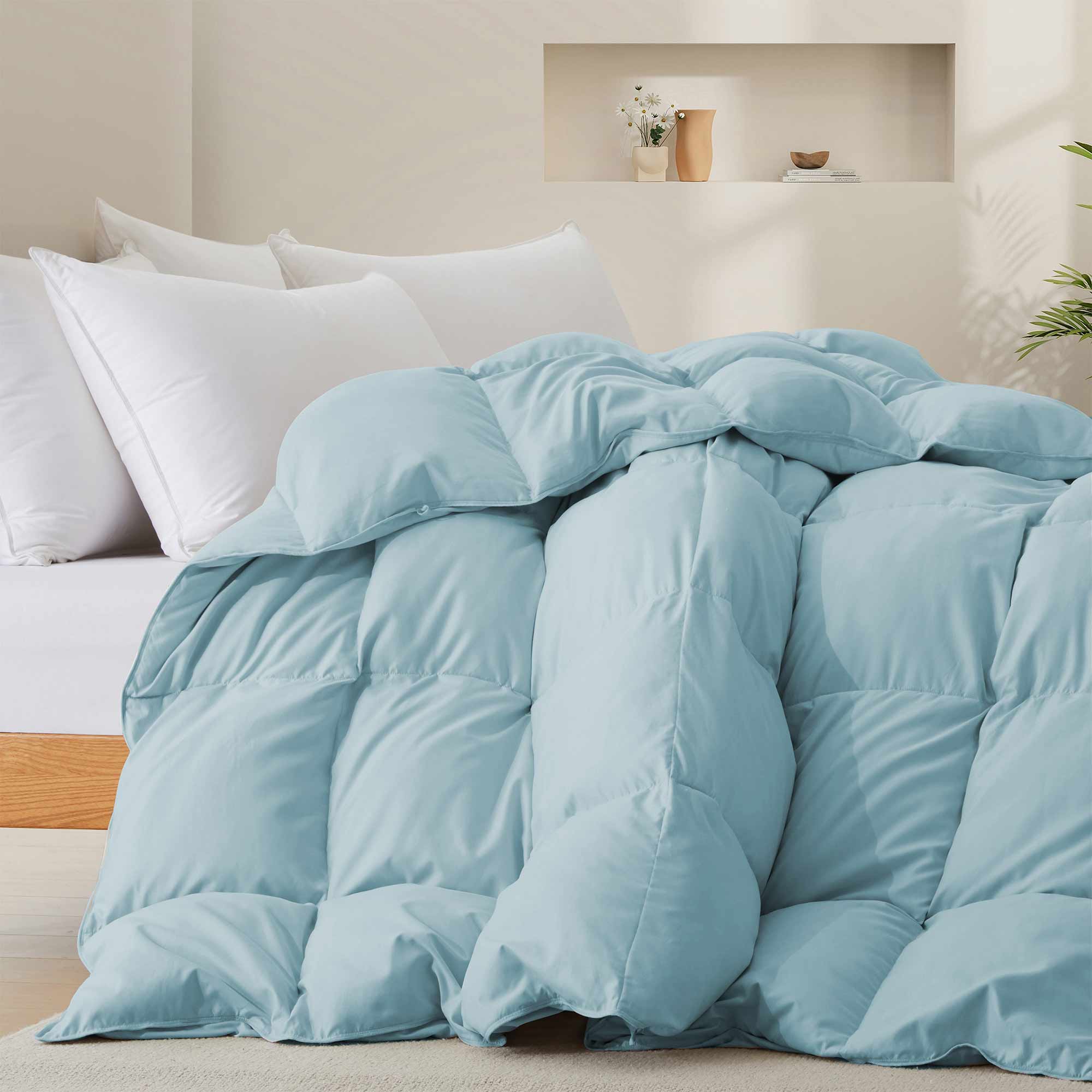 The down comforter with feathers is enveloped in the pristine shades of Sky Blue. Enjoy a cloud-like experience for a cozy sleep with this superior quality down feather comforter with duvet ties.