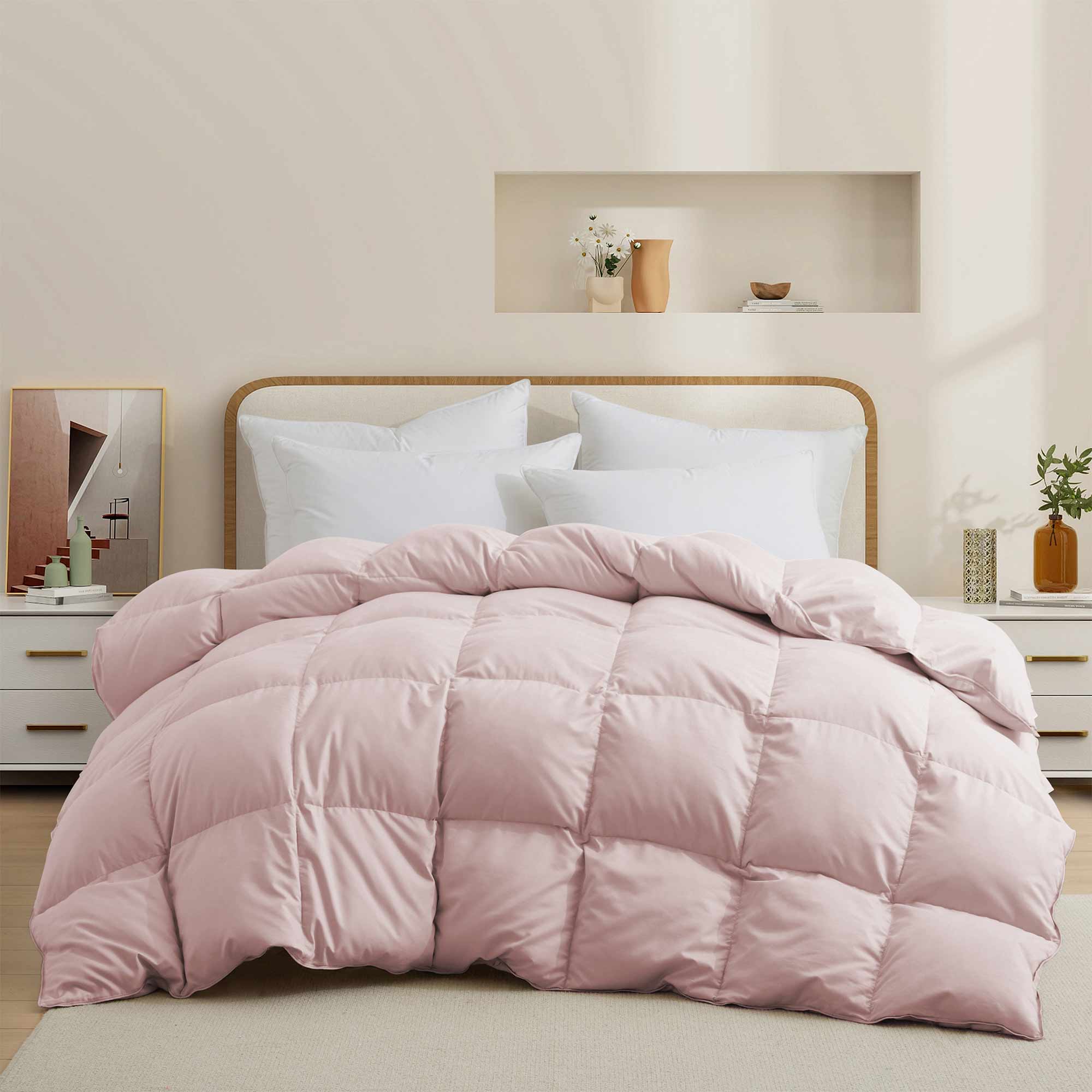 The feather goose down comforter is available in the feminine tones of Pink. Enjoy balanced year-round warmth with this feather goose down comforter.