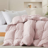 The feather goose down comforter is available in the feminine tones of Pink. Enjoy balanced year-round warmth with this feather goose down comforter.
