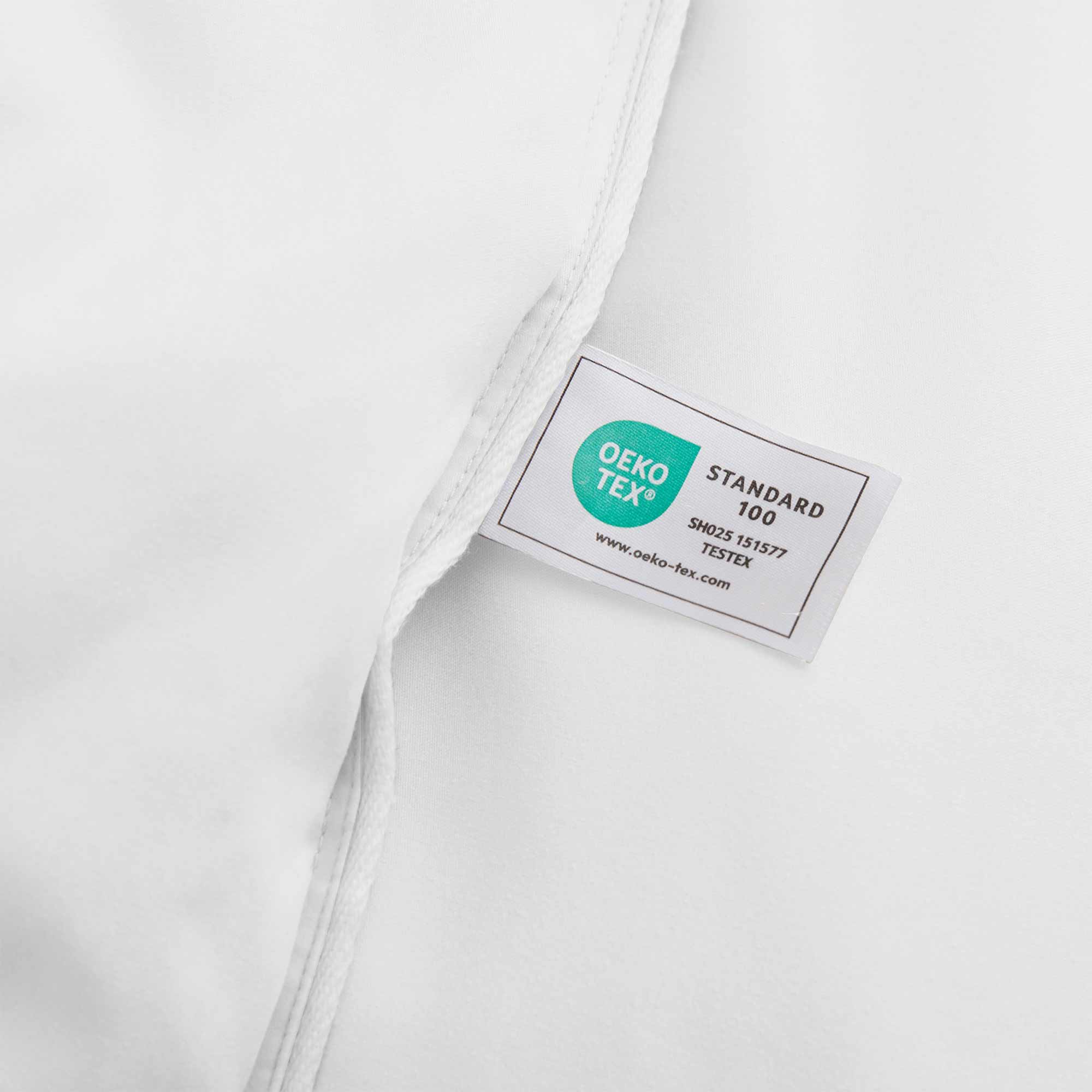 Fresh white tones are brushed over the all-size comforter. Add a touch of all-around luxurious warmth to your modern bedroom design with this down comforter with feathers.