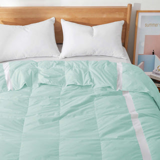 The entire comforter is painted in the refreshing hues of Mint. Welcome the crisp and revitalizing breeze of summer to your abode with this lightweight comforter for summer or feather down blanket.
