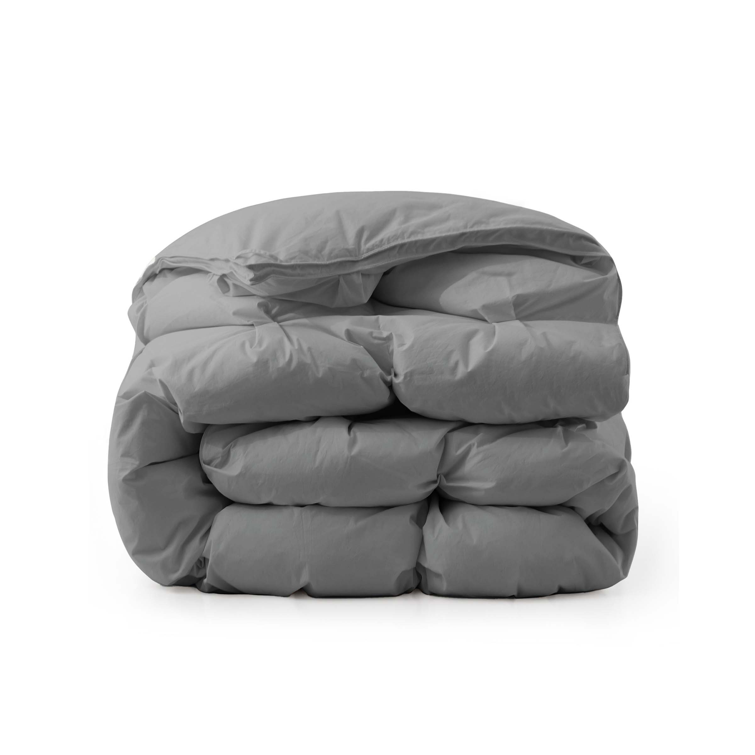 The medium warmth fluffy comforter is covered in the somber tones of gray. Add a touch of panache to your personal space with this high-quality all-season down comforter with corner taps for a snug sleep experience.