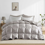 The comforter is covered in a brilliant silvery-gray shade and features soft damask patterns throughout that add a touch of texture to the fabric. Bring home the beauty of sophistication with this silk comforter.
