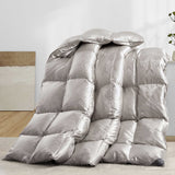 The comforter is covered in a brilliant silvery-gray shade and features soft damask patterns throughout that add a touch of texture to the fabric. Bring home the beauty of sophistication with this silk comforter.