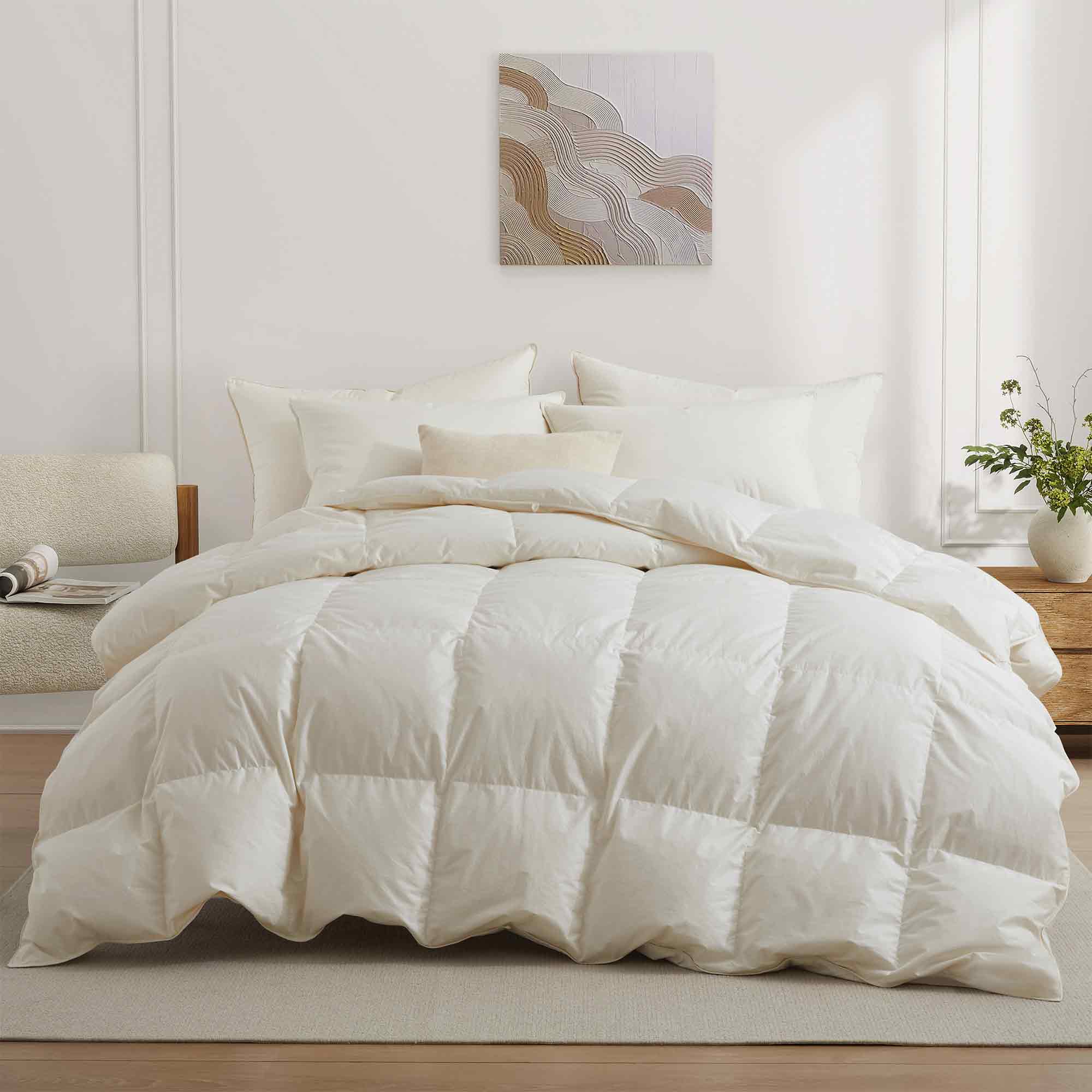 Crafted with a 100% organic cotton shell and filled with 90% natural white down, this comforter offers superior warmth and breathability. Its 800 fill power ensures a lightweight yet insulating sleep experience. Designed for year-round comfort, it features baffle box construction to maintain even fill distribution. Available in all-season and extra warm options, this comforter combines eco-friendly materials with luxurious softness for a restful night's sleep.