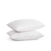 The plush pillow design is colored in the harmonious tones of white. Add a welcoming feel and luxurious comfort to your bedroom space with these overstuffed feather pillows.