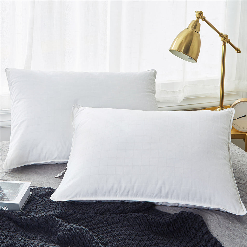 This medium-firm option in pillows with goose feathers is colored in the serene white hues. Adding these down feather pillows to your bedroom will give it an inviting atmosphere and luxurious feel.
