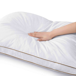 The white goose feather gusset pillows are covered in soft white hues. Welcome the perfect cradle of cloud-like comfort to your bedtime routine and improve your sleep quality with these feather goosedown pillows.
